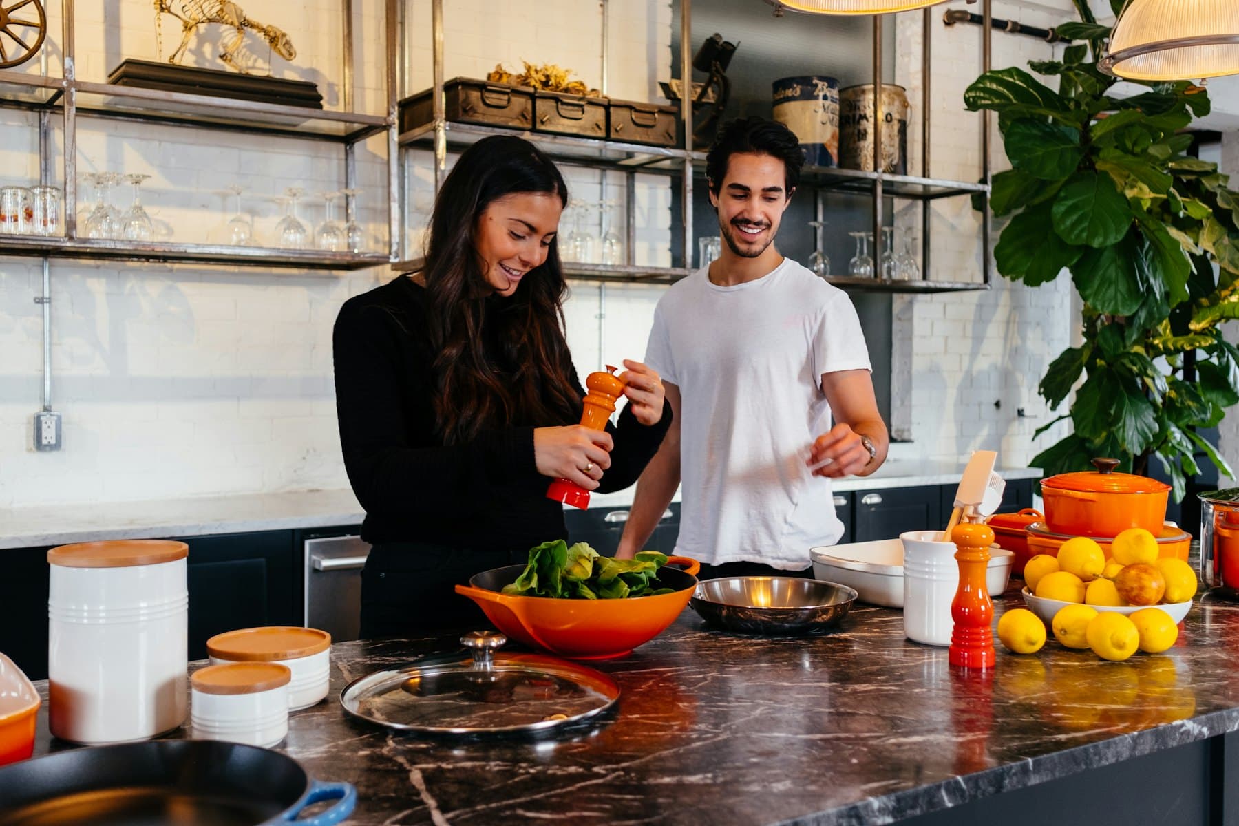 A man and a woman at their kitchen table