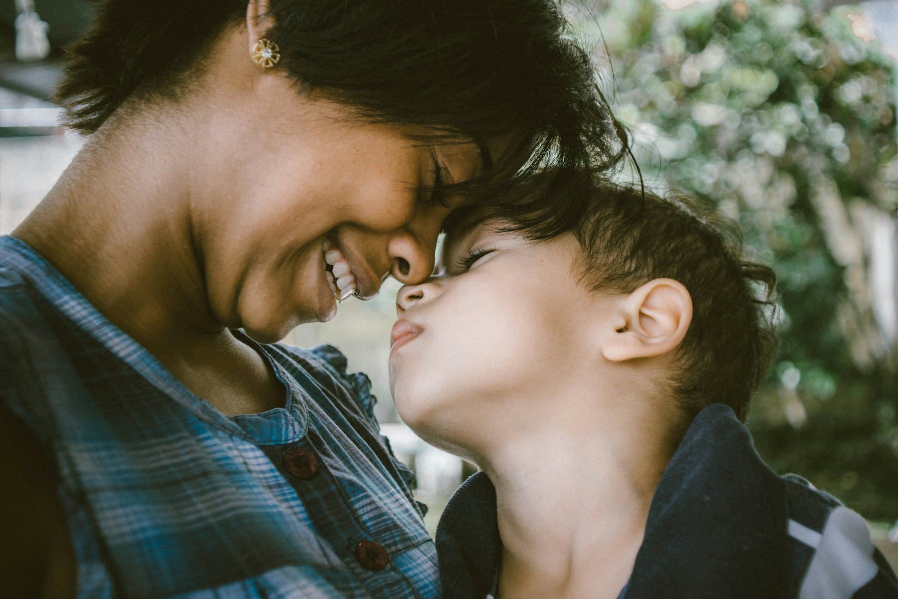 A woman and a boy together