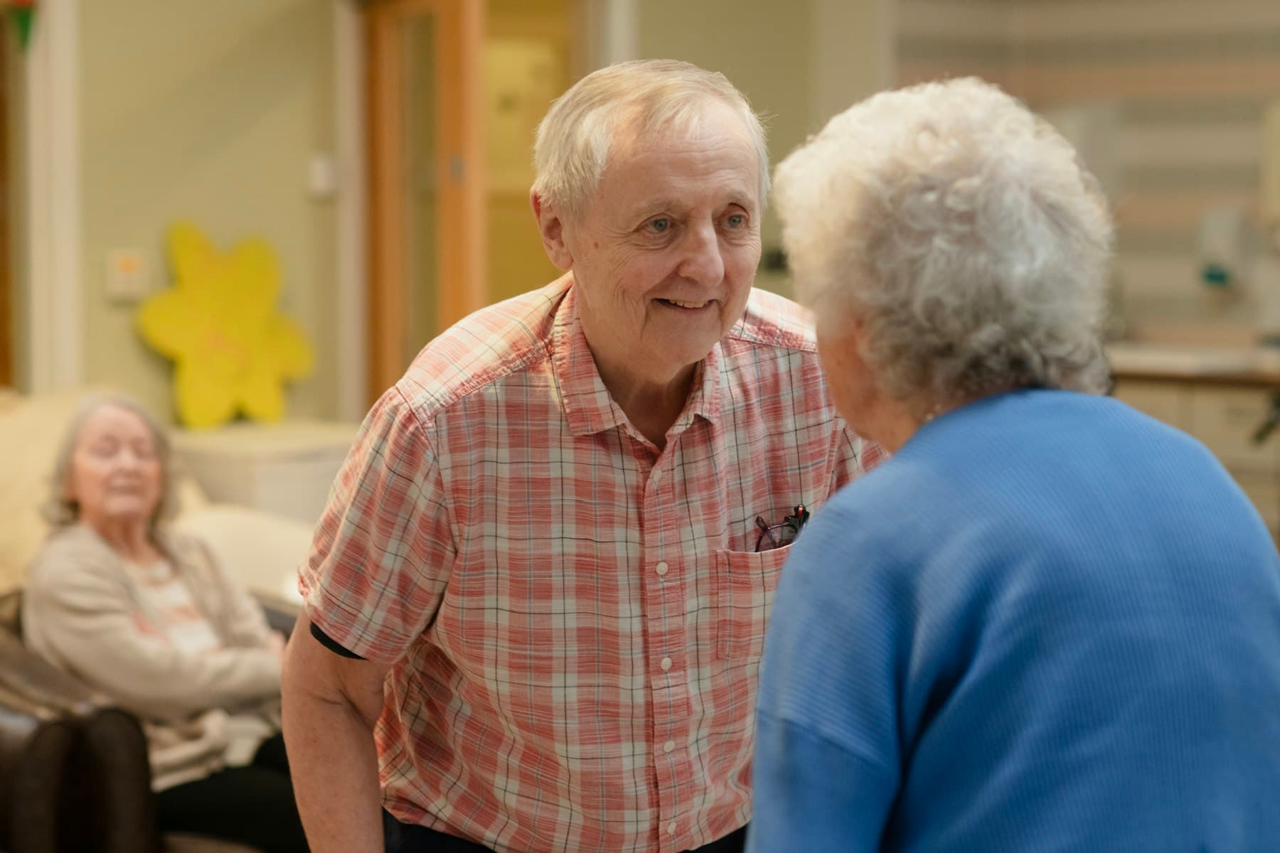 An older couple talking together