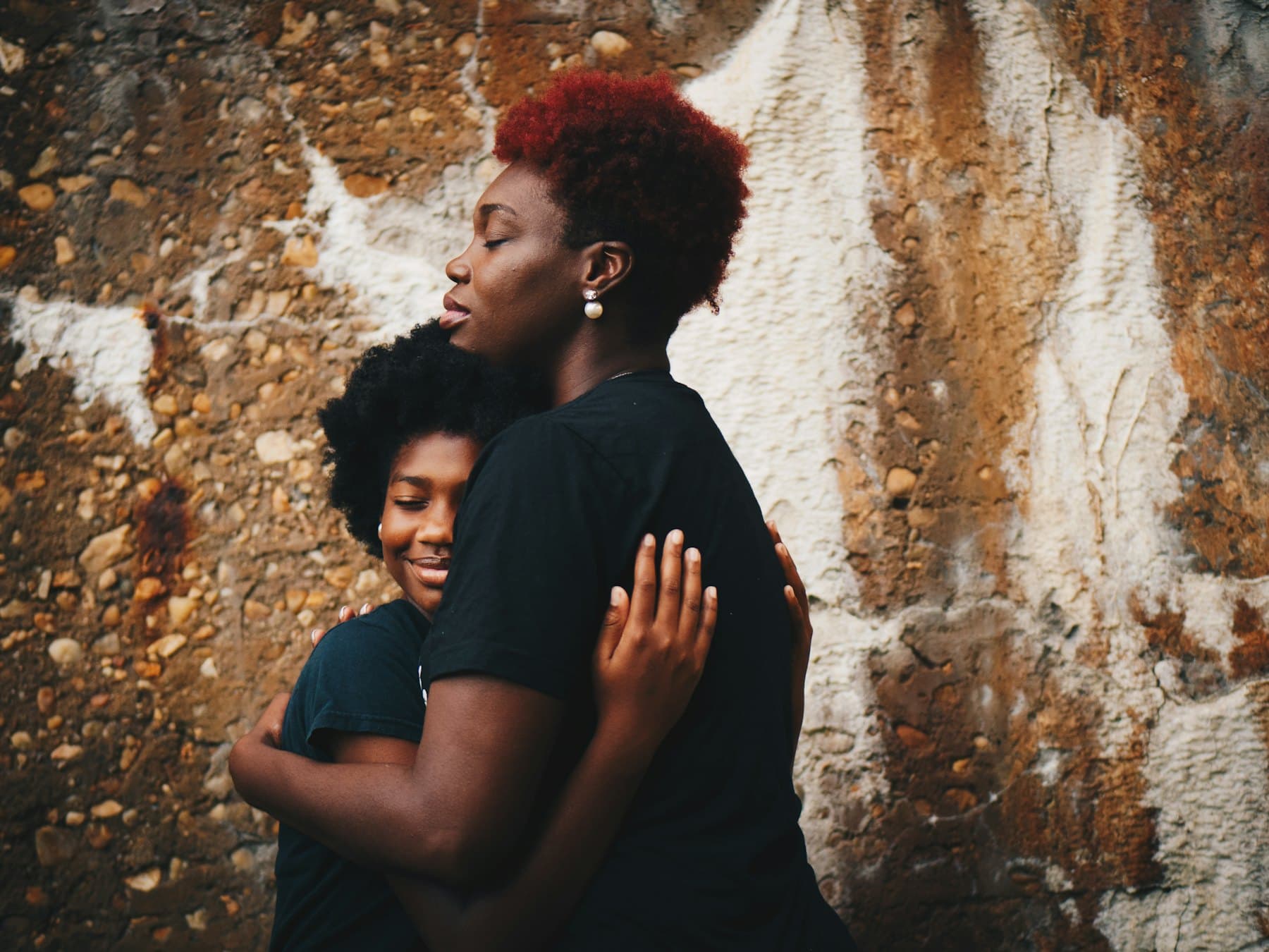 Two women hugging