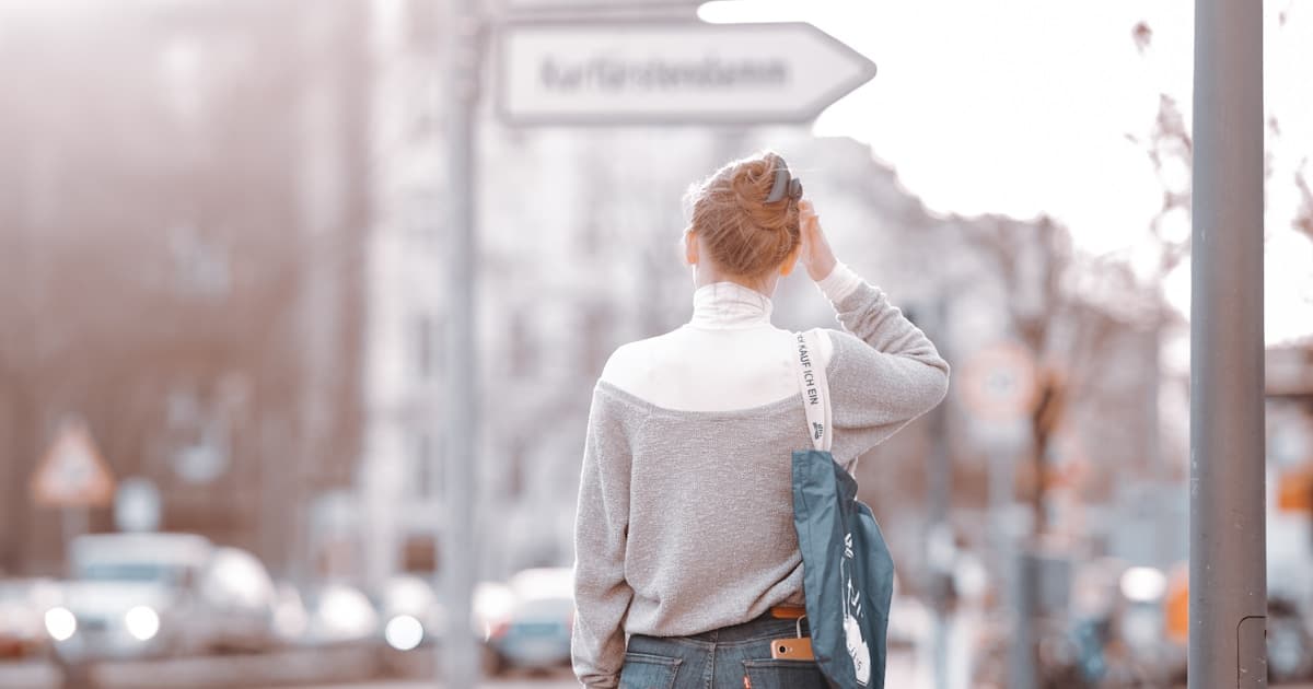 Person at a crossroads representing how to evaluate whether a rare disease clinical trial is right for you